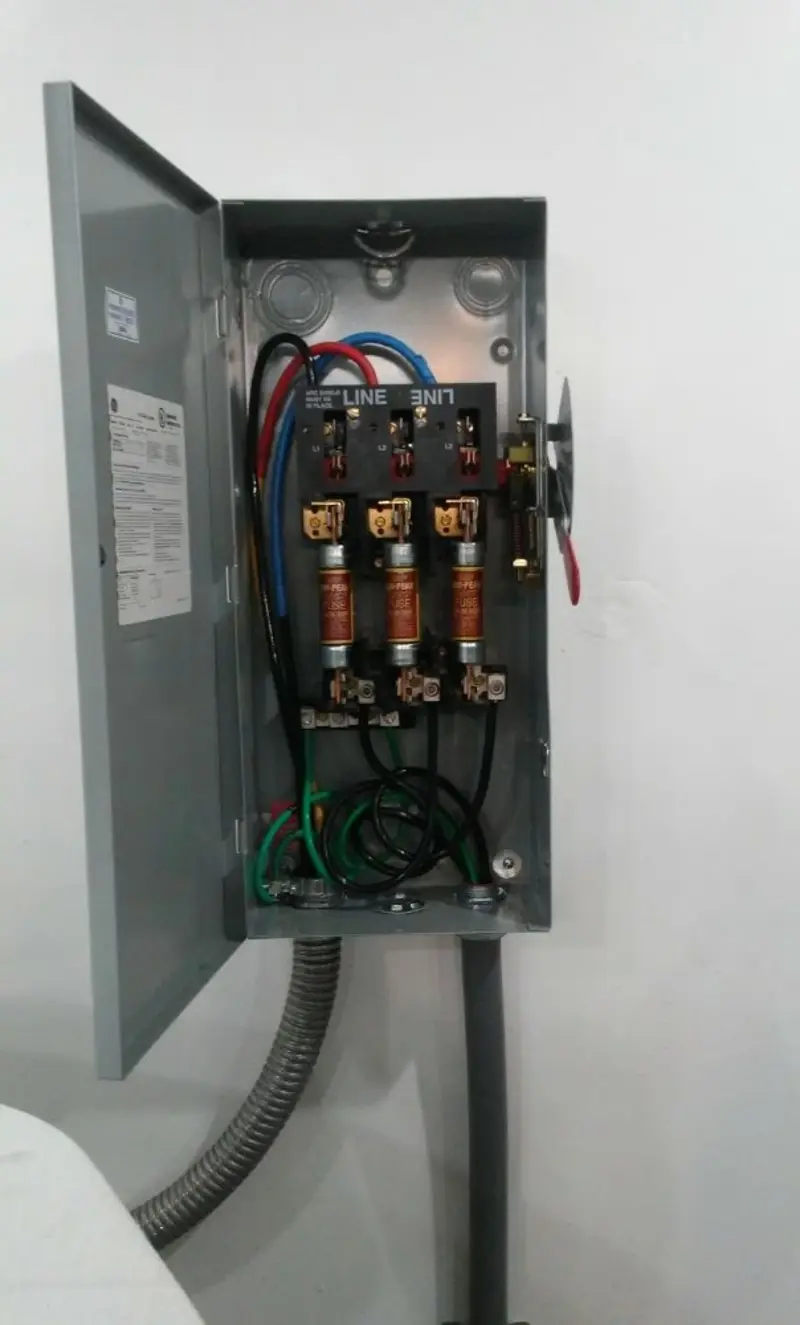 Three-phase disconnect switch installed for Smoke Detector Installation in Manchester